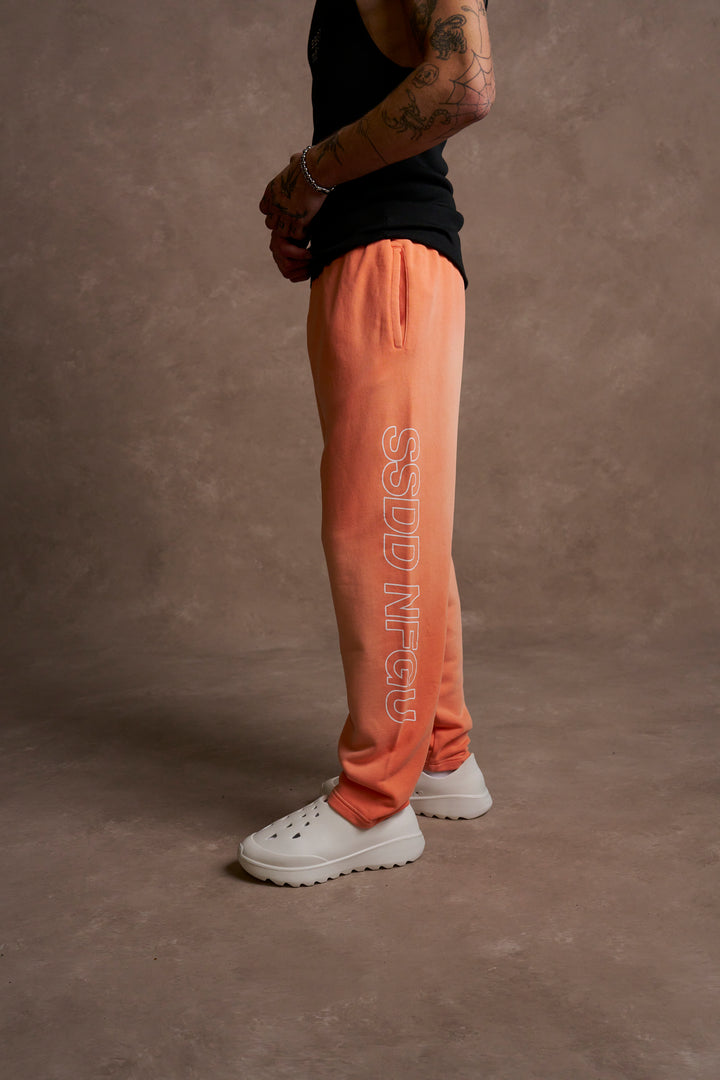 Run Together Kumite V2 Sweat Pants in Neon Coral Sun Fade