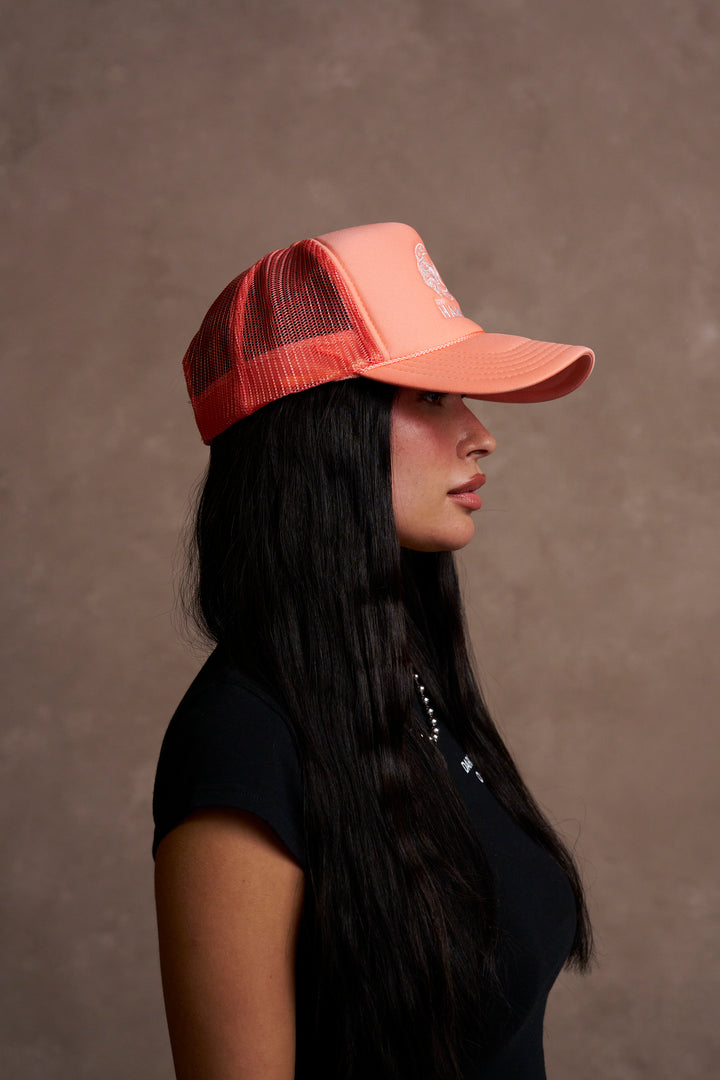 Wolves Ohana Trucker Hat in Neon Coral