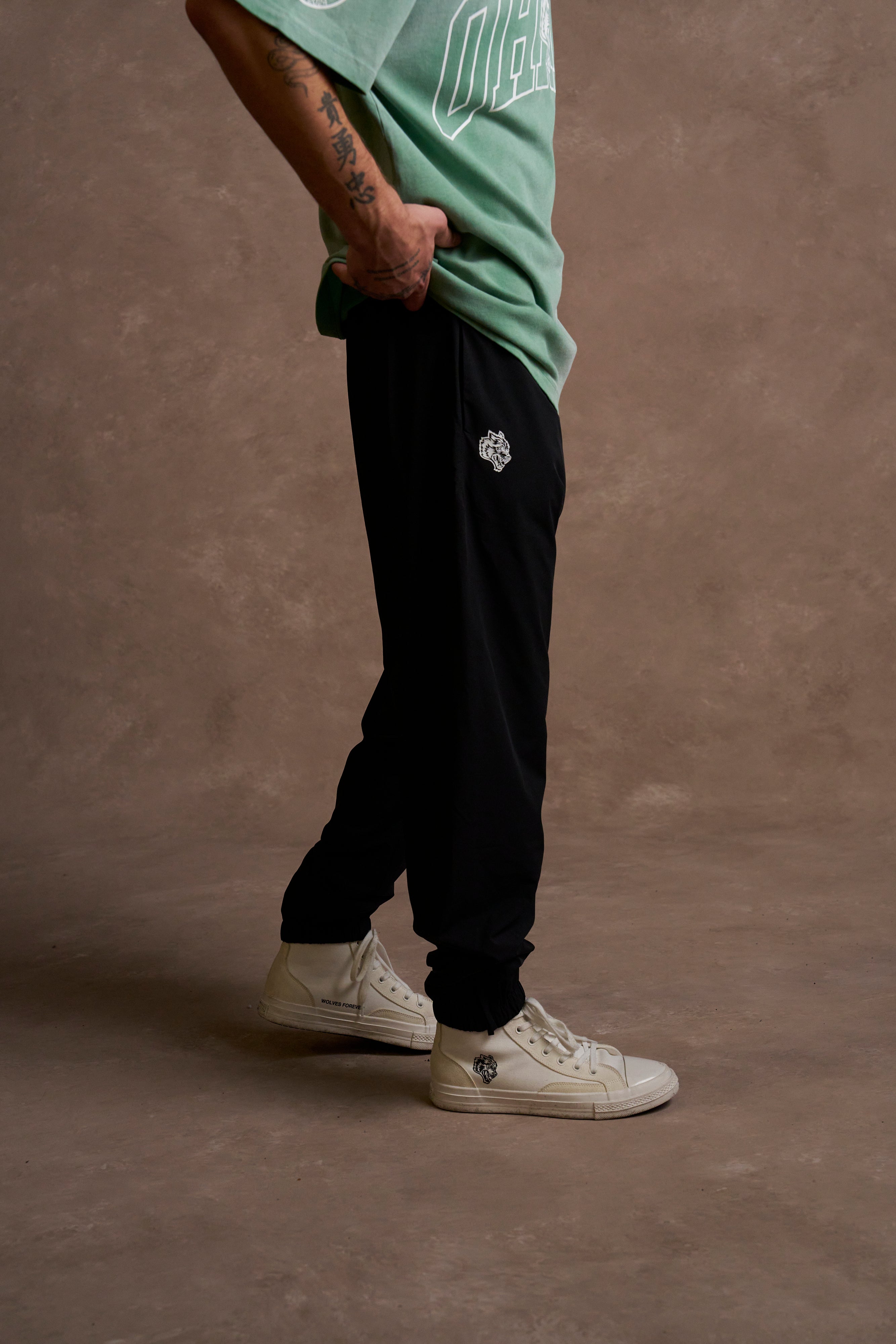 Iron Hybrid Nylon Track Pants in Black