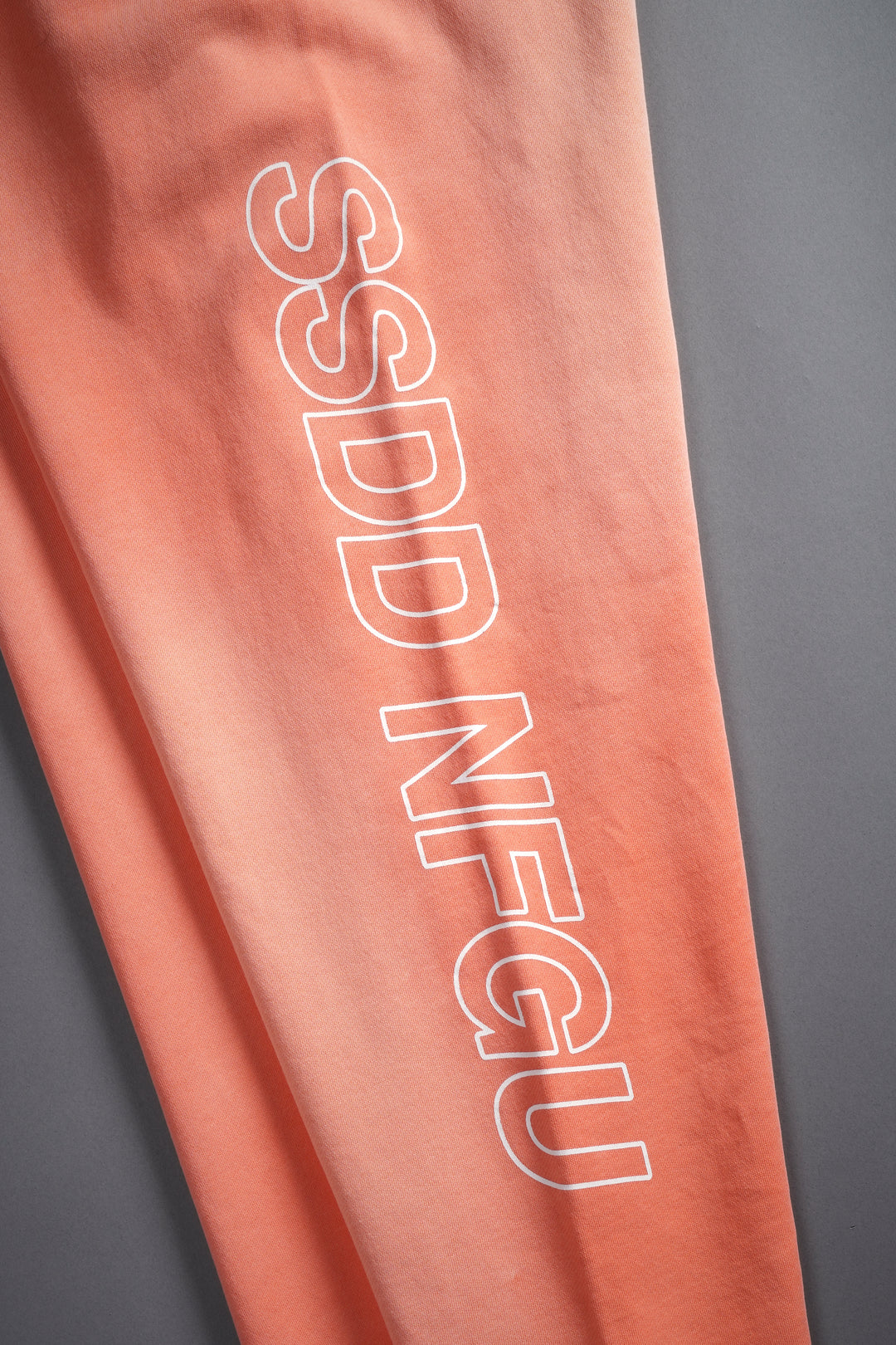 Run Together Kumite V2 Sweat Pants in Neon Coral Sun Fade