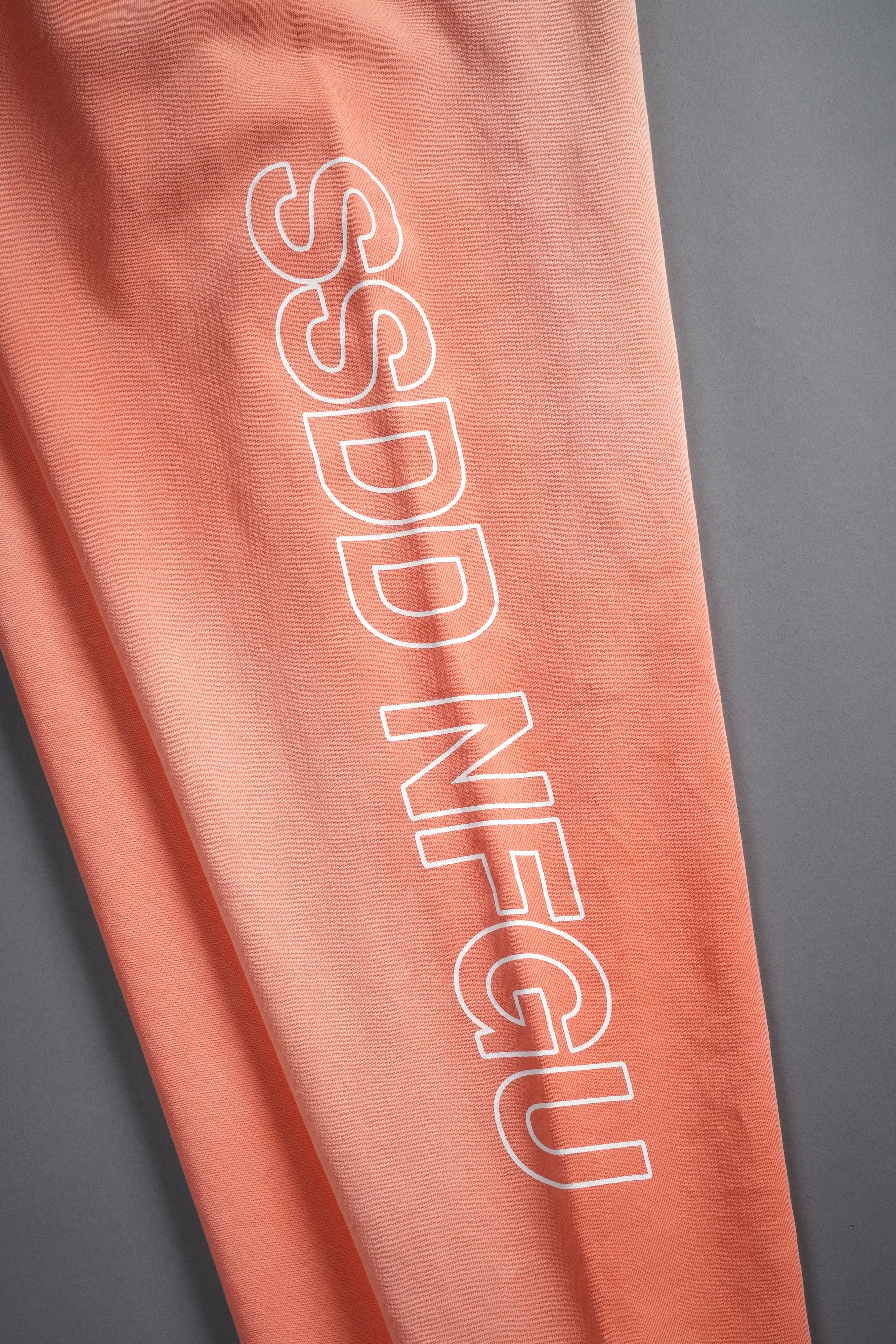 Run Together Kumite V2 Sweat Pants in Neon Coral Sun Fade